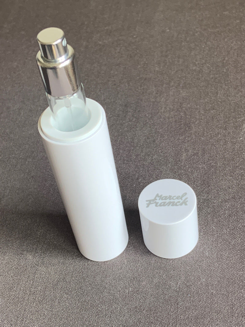 EXCHANGEABLE VIAL TRAVEL/PURSE PERFUME ATOMIZER IN CELLULOSE WHITE