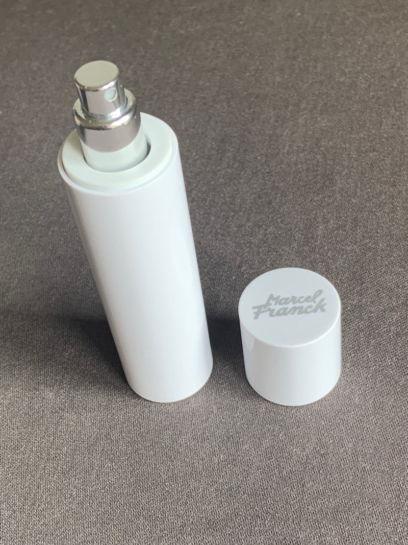 EXCHANGEABLE VIAL TRAVEL/PURSE PERFUME ATOMIZER IN CELLULOSE WHITE